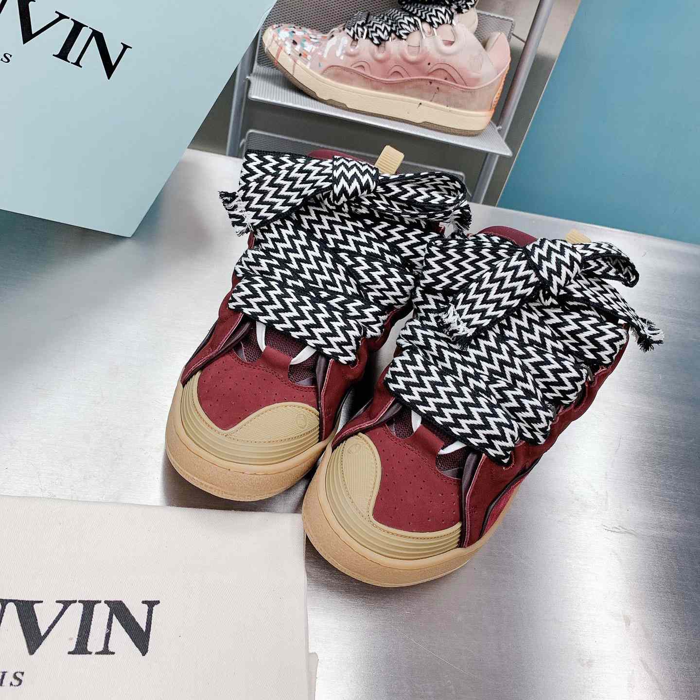 Lanvin Leather Curb Sneakers - FashionPlug