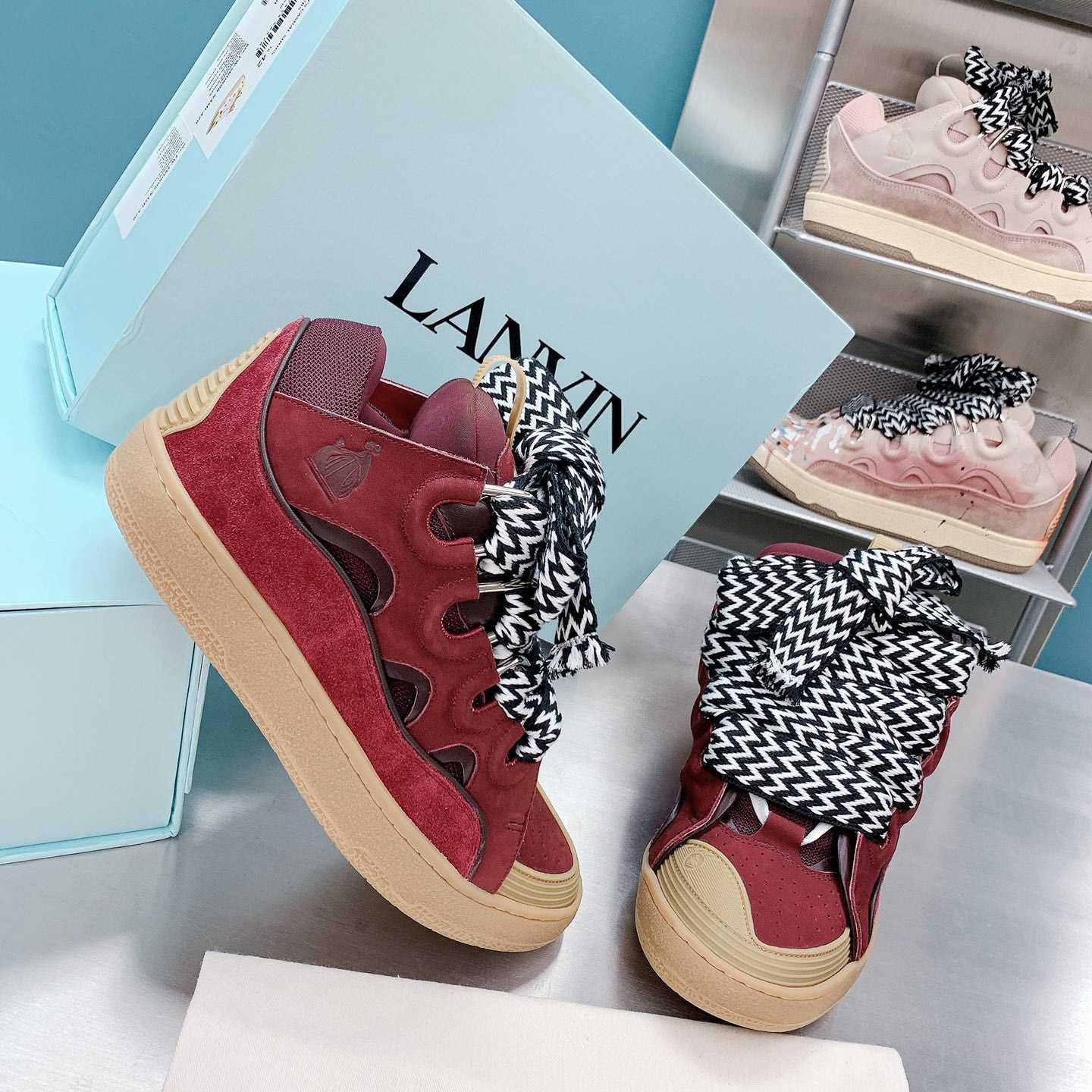 Lanvin Leather Curb Sneakers - FashionPlug
