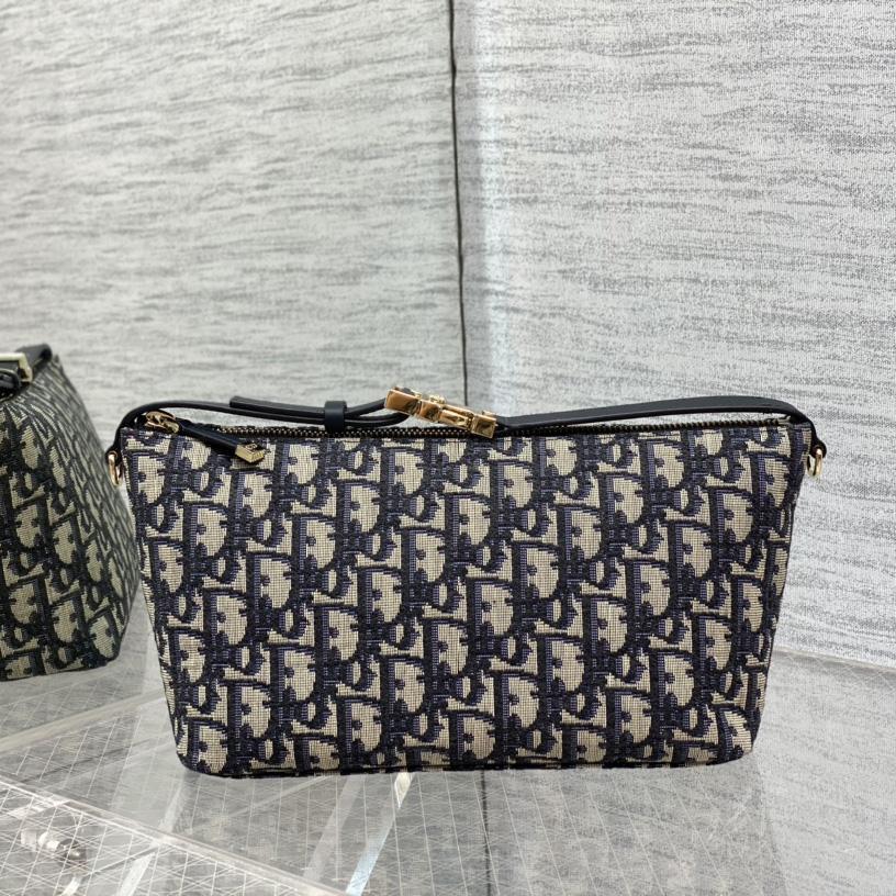Dior Medium Diortravel Nomad Pouch - FashionPlug