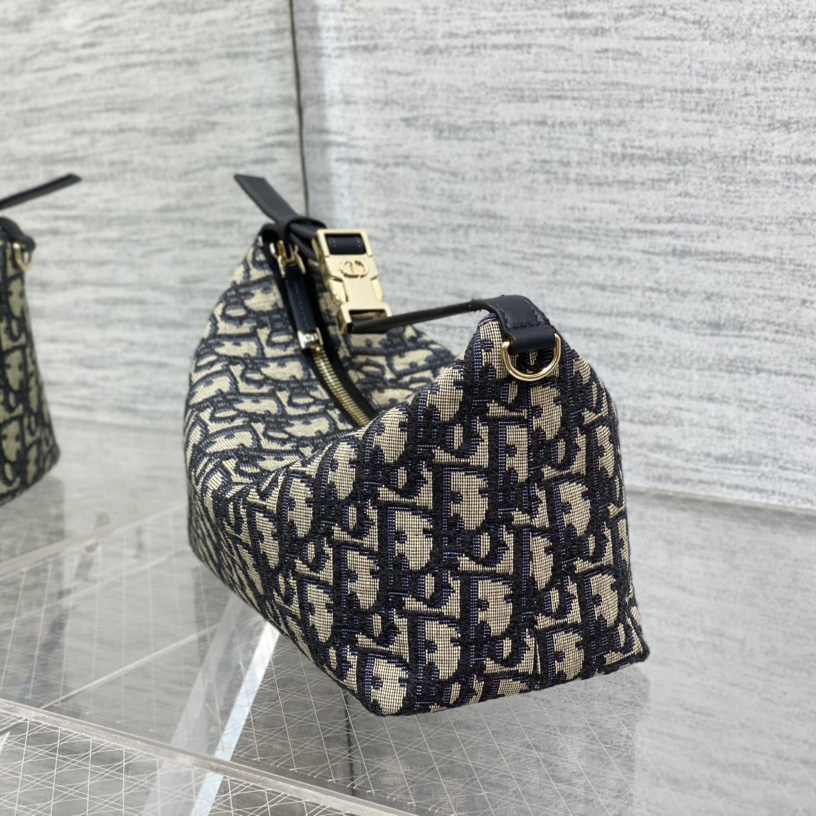 Dior Medium Diortravel Nomad Pouch - FashionPlug