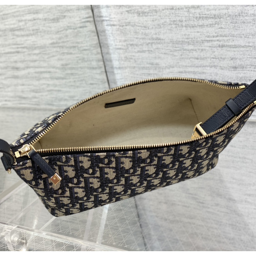 Dior Medium Diortravel Nomad Pouch - FashionPlug