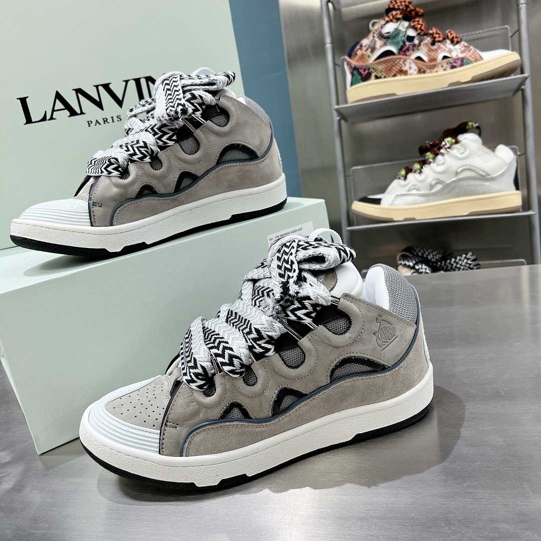 Lanvin Leather Curb Sneakers - FashionPlug
