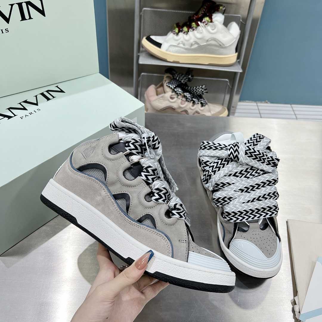 Lanvin Leather Curb Sneakers - FashionPlug