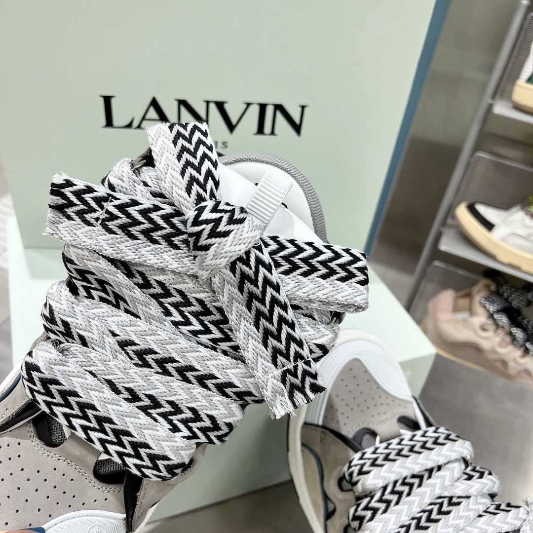 Lanvin Leather Curb Sneakers - FashionPlug