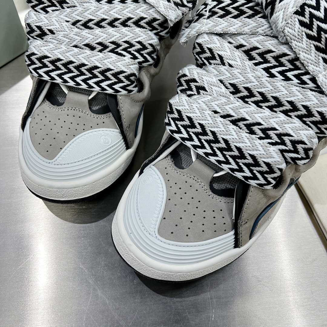 Lanvin Leather Curb Sneakers - FashionPlug
