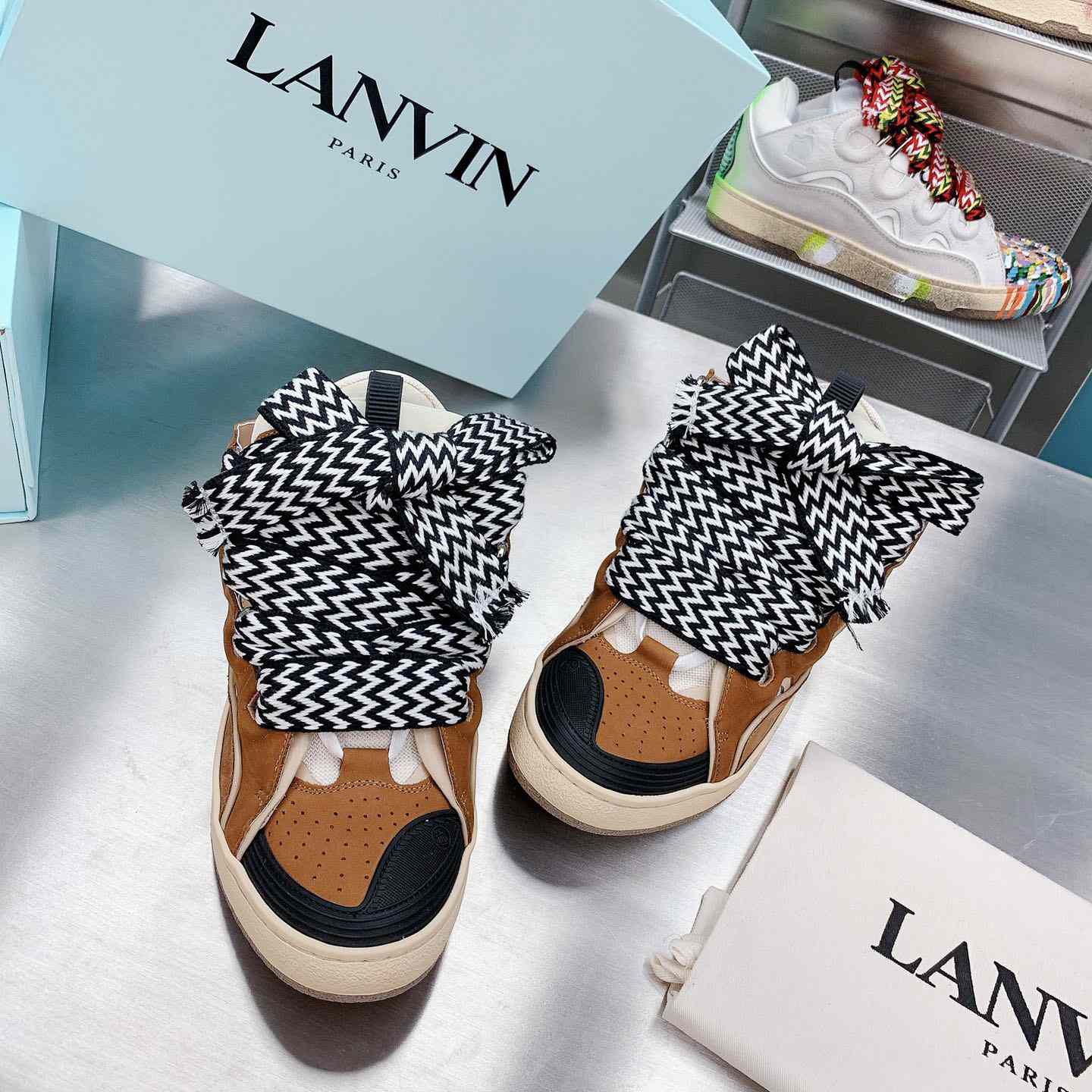 Lanvin Curb Sneakers - FashionPlug