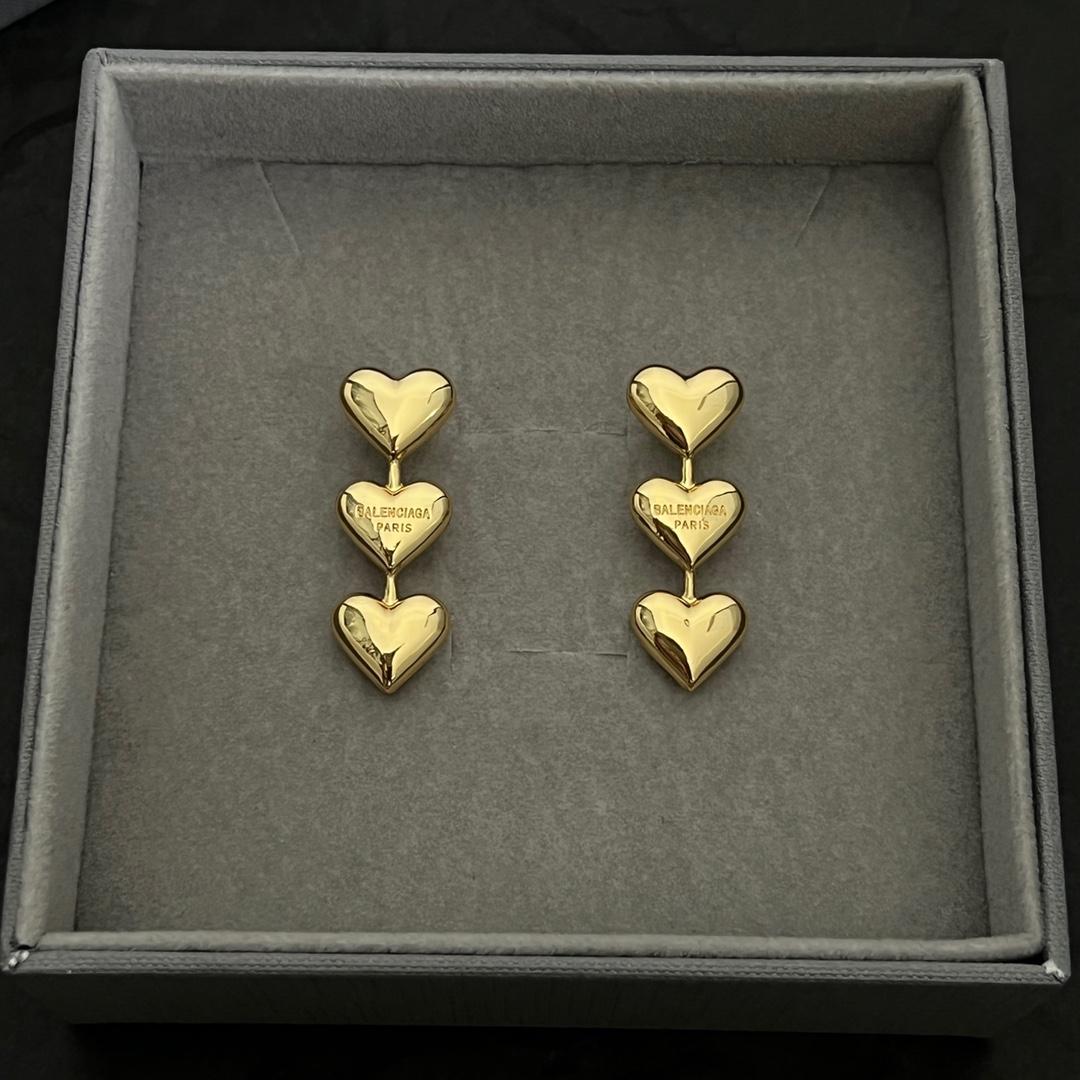 Balenciaga Women's Heart Earrings In Gold - FashionPlug
