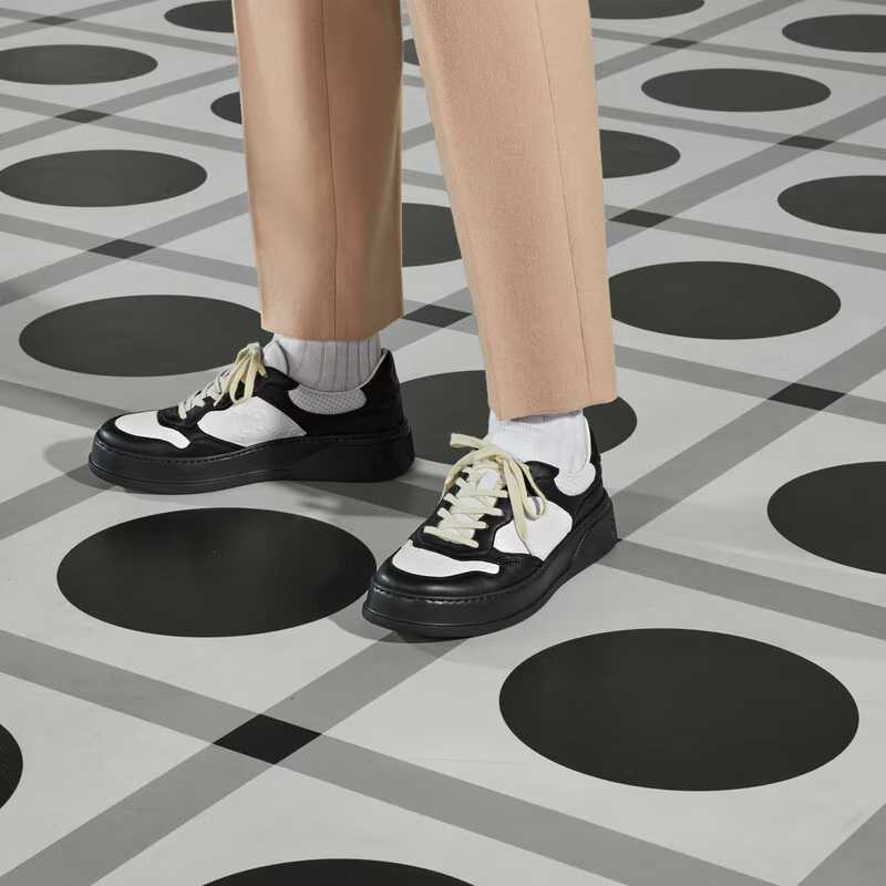Gucci GG Embossed Sneaker - FashionPlug