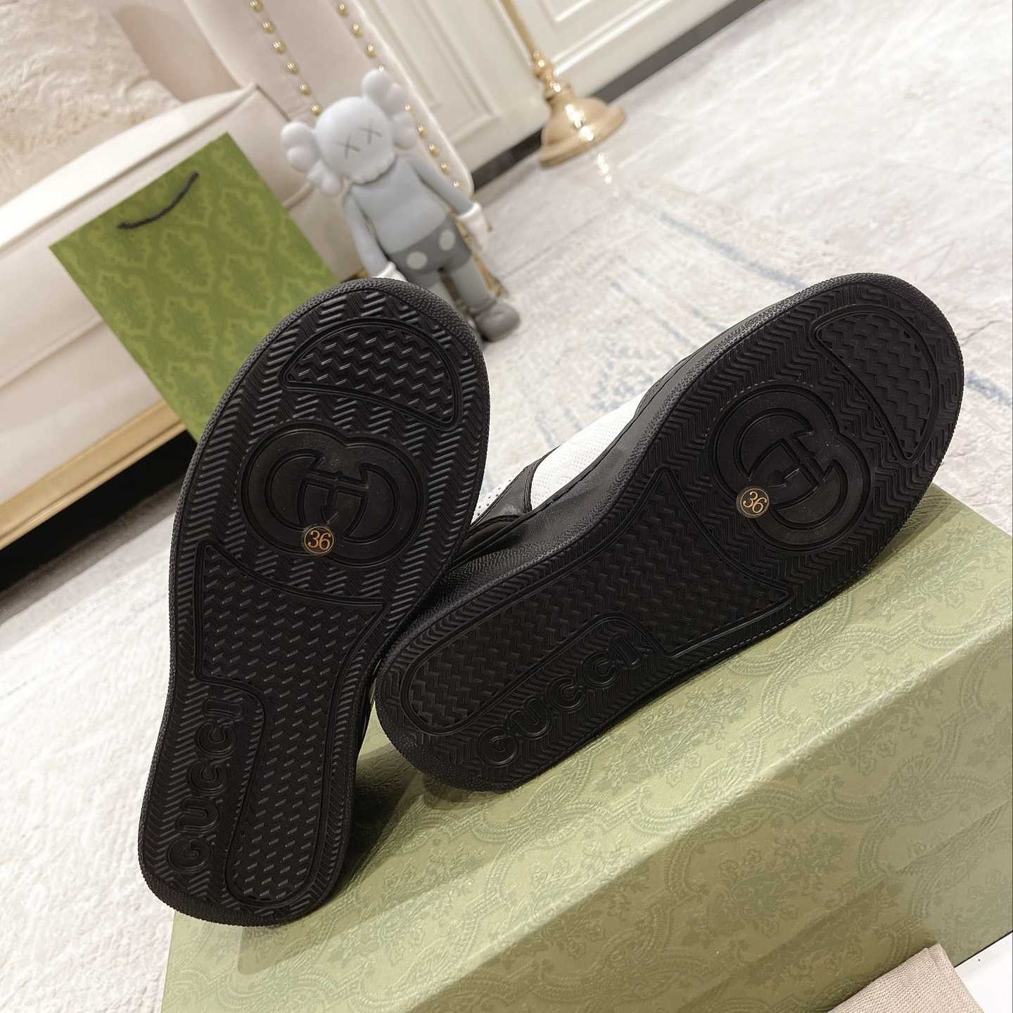 Gucci GG Embossed Sneaker - FashionPlug