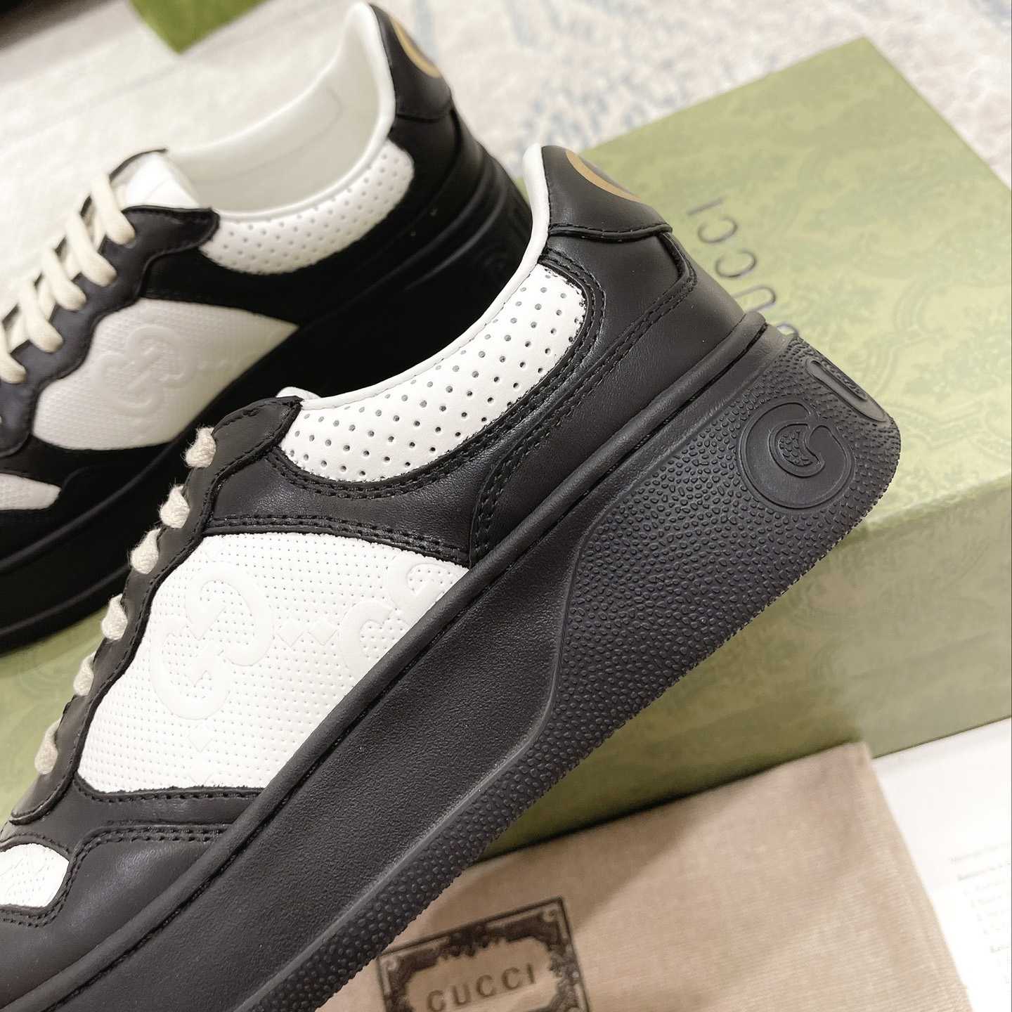 Gucci GG Embossed Sneaker - FashionPlug
