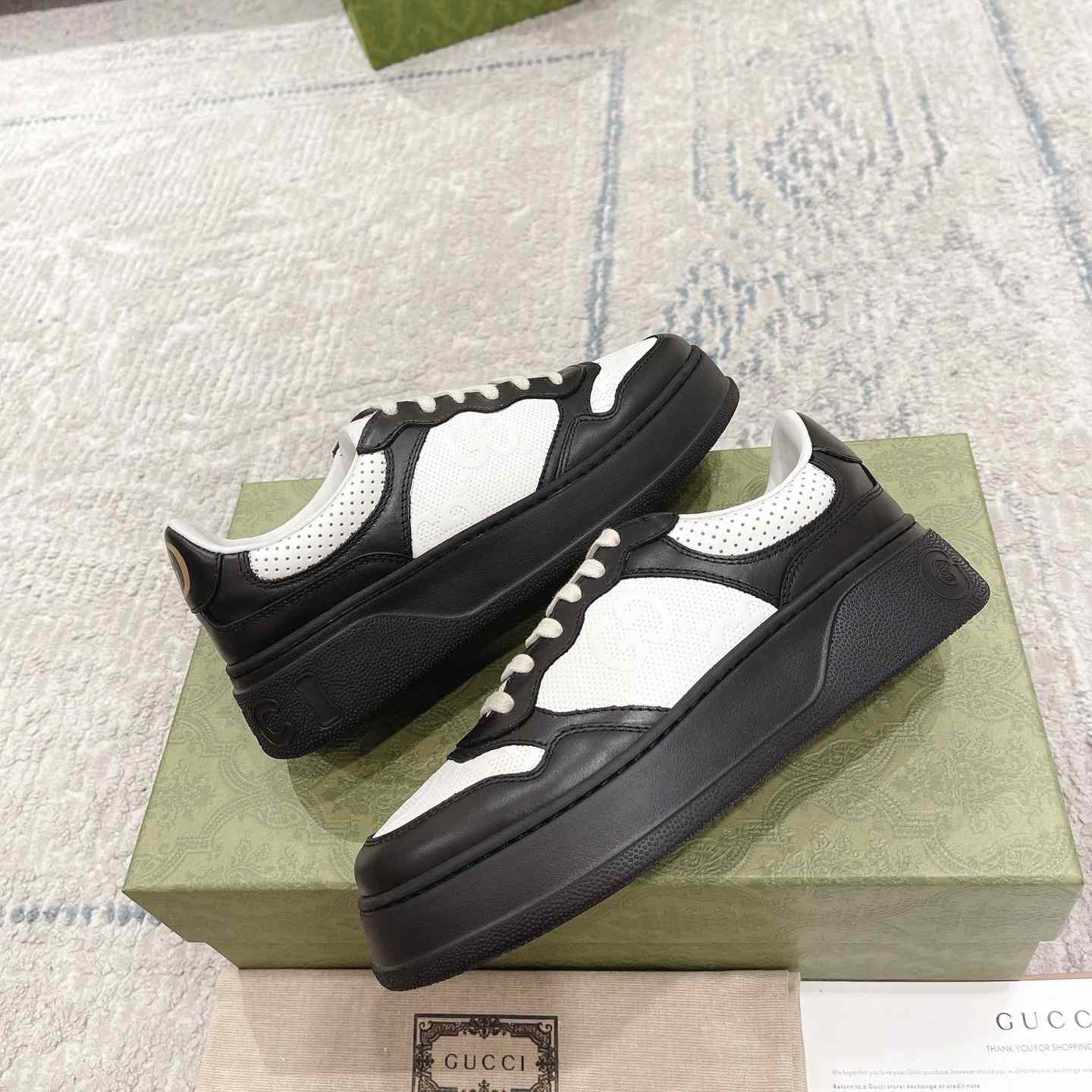 Gucci GG Embossed Sneaker - FashionPlug