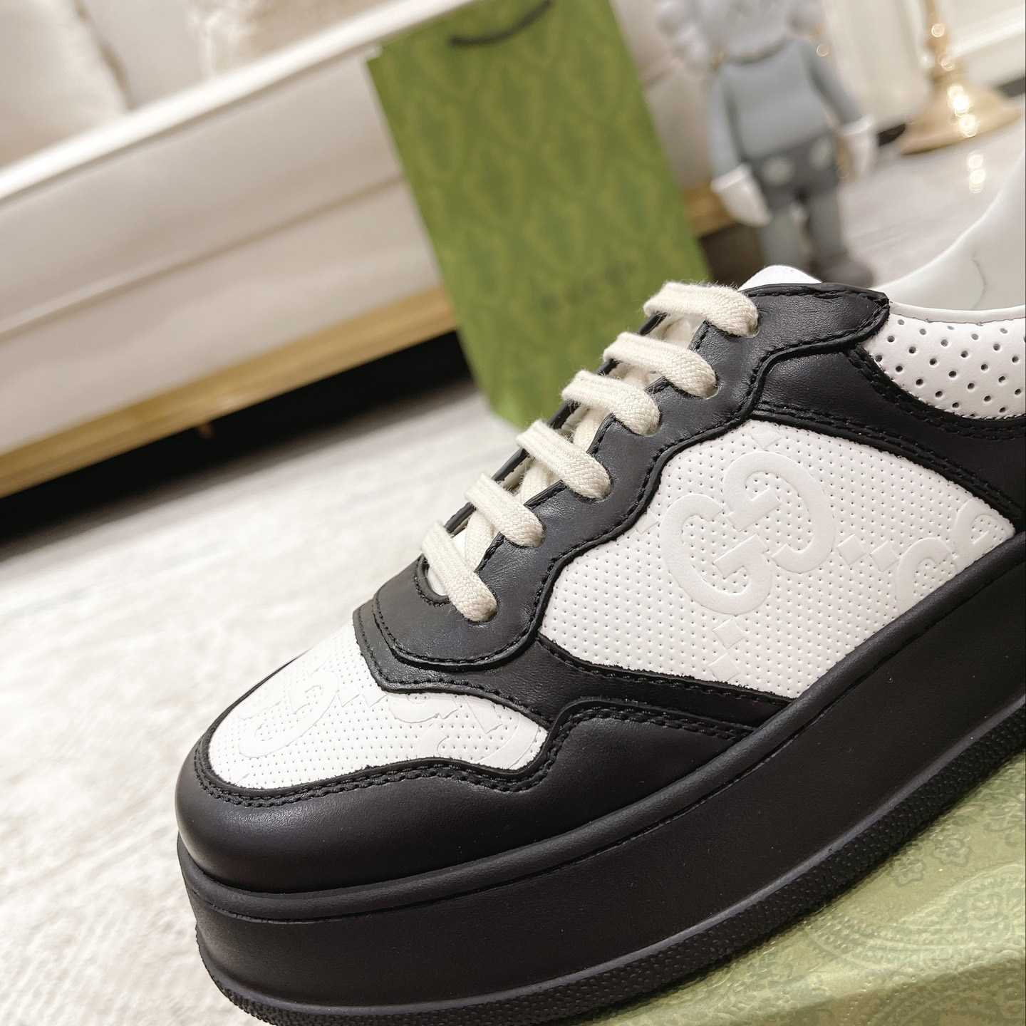 Gucci GG Embossed Sneaker - FashionPlug