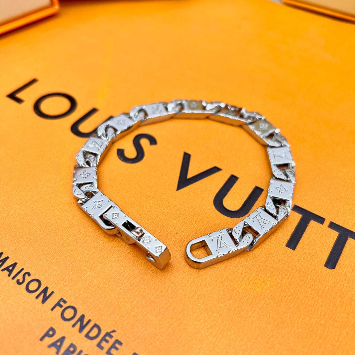 Louis Vuitton Monogram Tied Up Bracelet    M0921 - FashionPlug