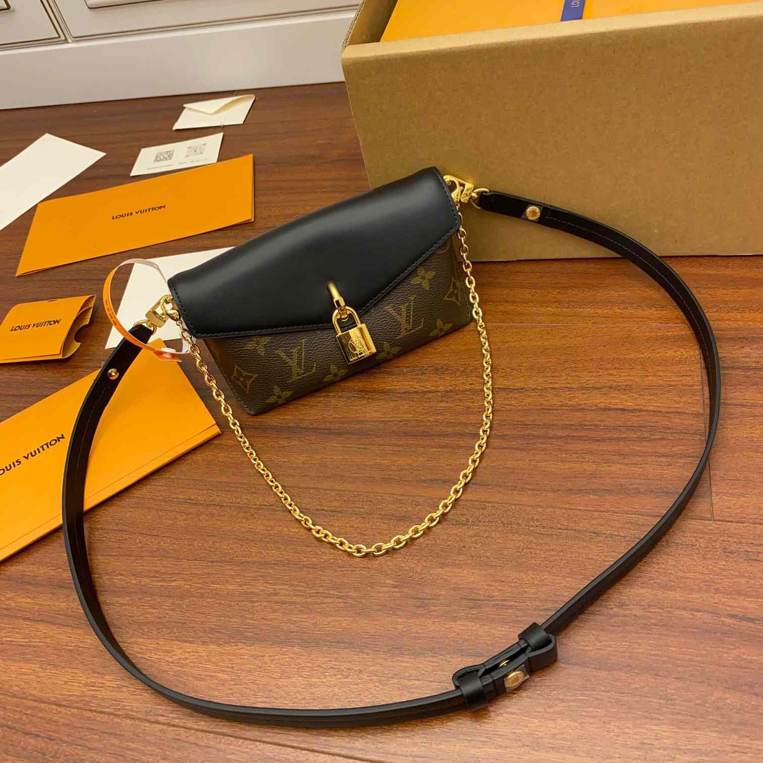 Louis Vuitton Padlock On Strap   M80559 - FashionPlug