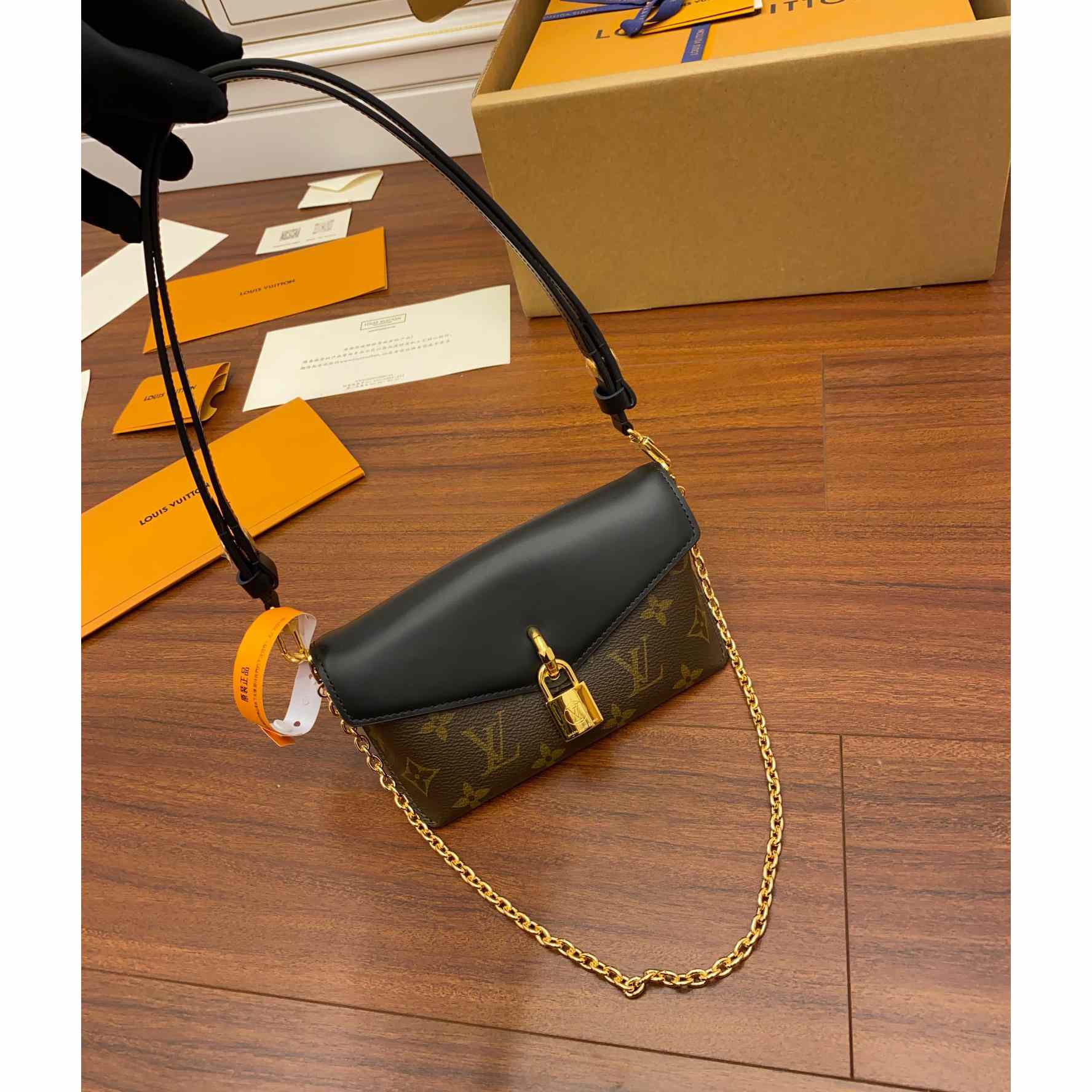 Louis Vuitton Padlock On Strap   M80559 - FashionPlug