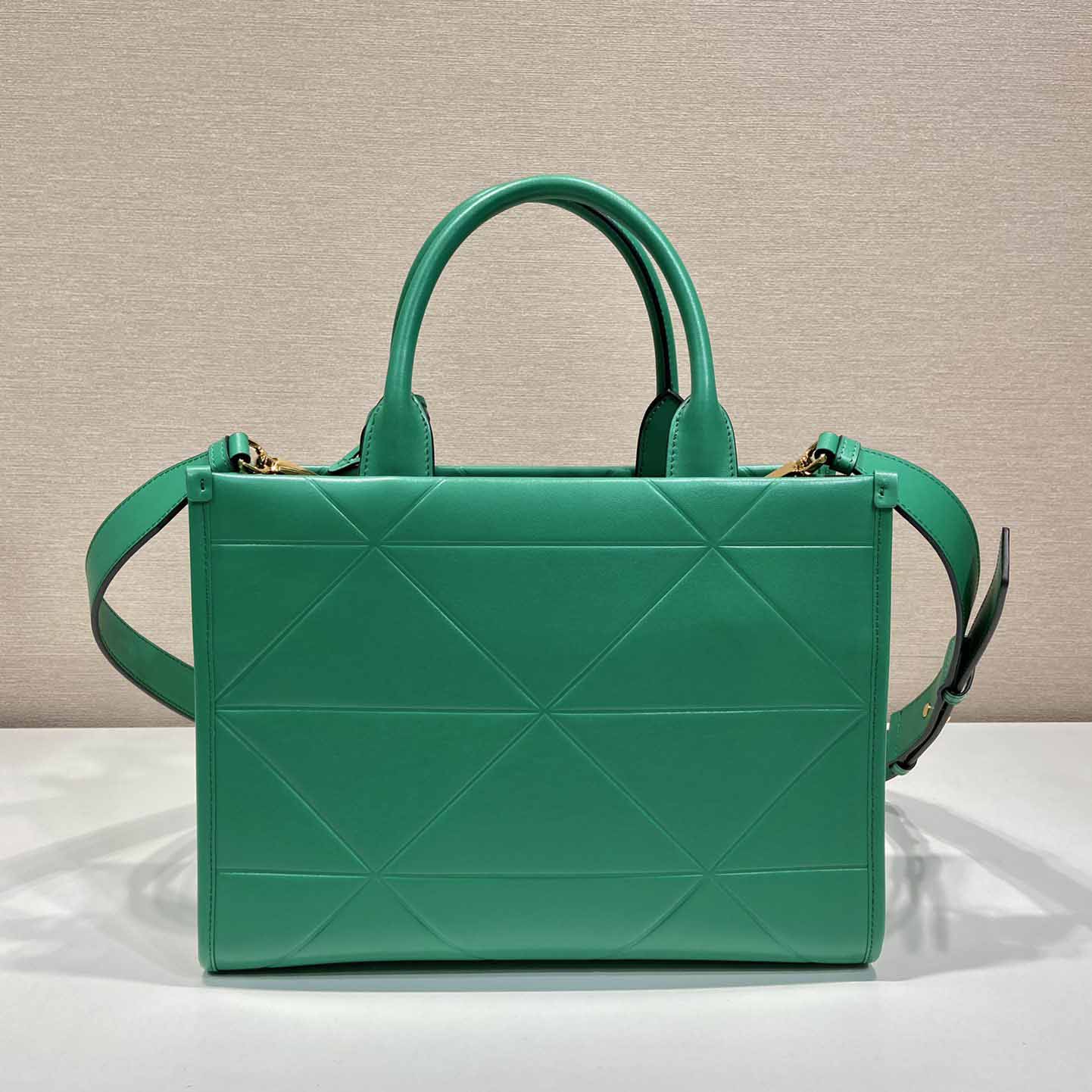 Prada Small Leather Prada Symbole Bag With Topstitching - FashionPlug