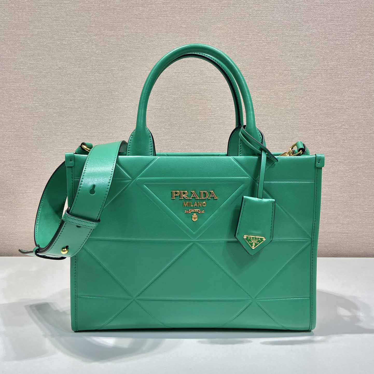 Prada Small Leather Prada Symbole Bag With Topstitching - FashionPlug