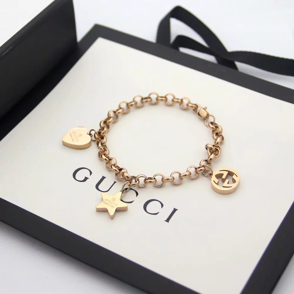 Gucci Sliver Bracelet With Gucci Charms - FashionPlug