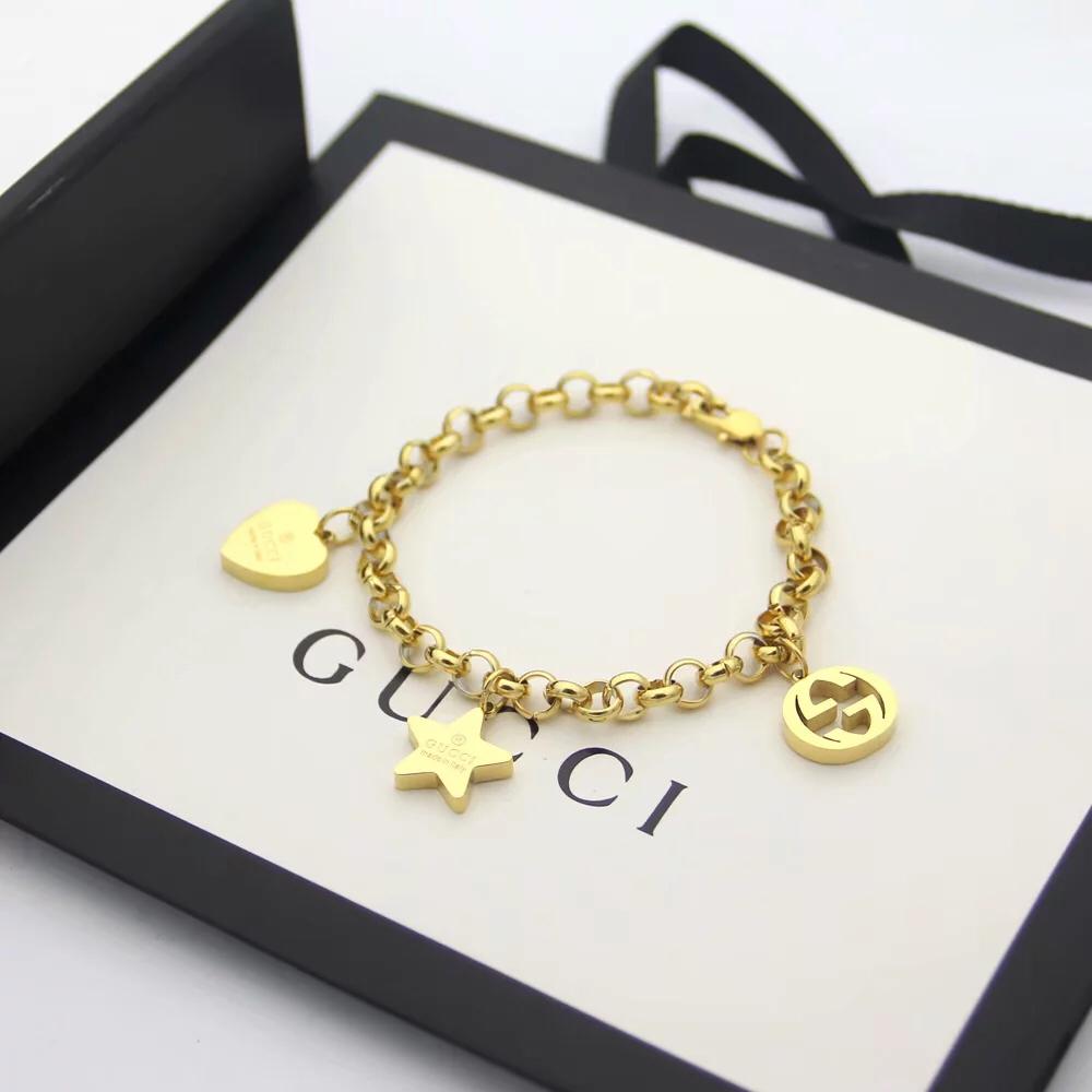 Gucci Sliver Bracelet With Gucci Charms - FashionPlug