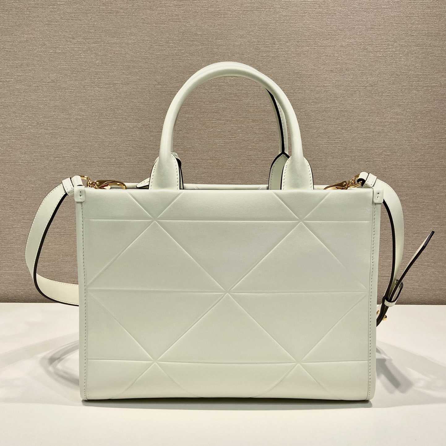 Prada Small Leather Prada Symbole Bag With Topstitching - FashionPlug