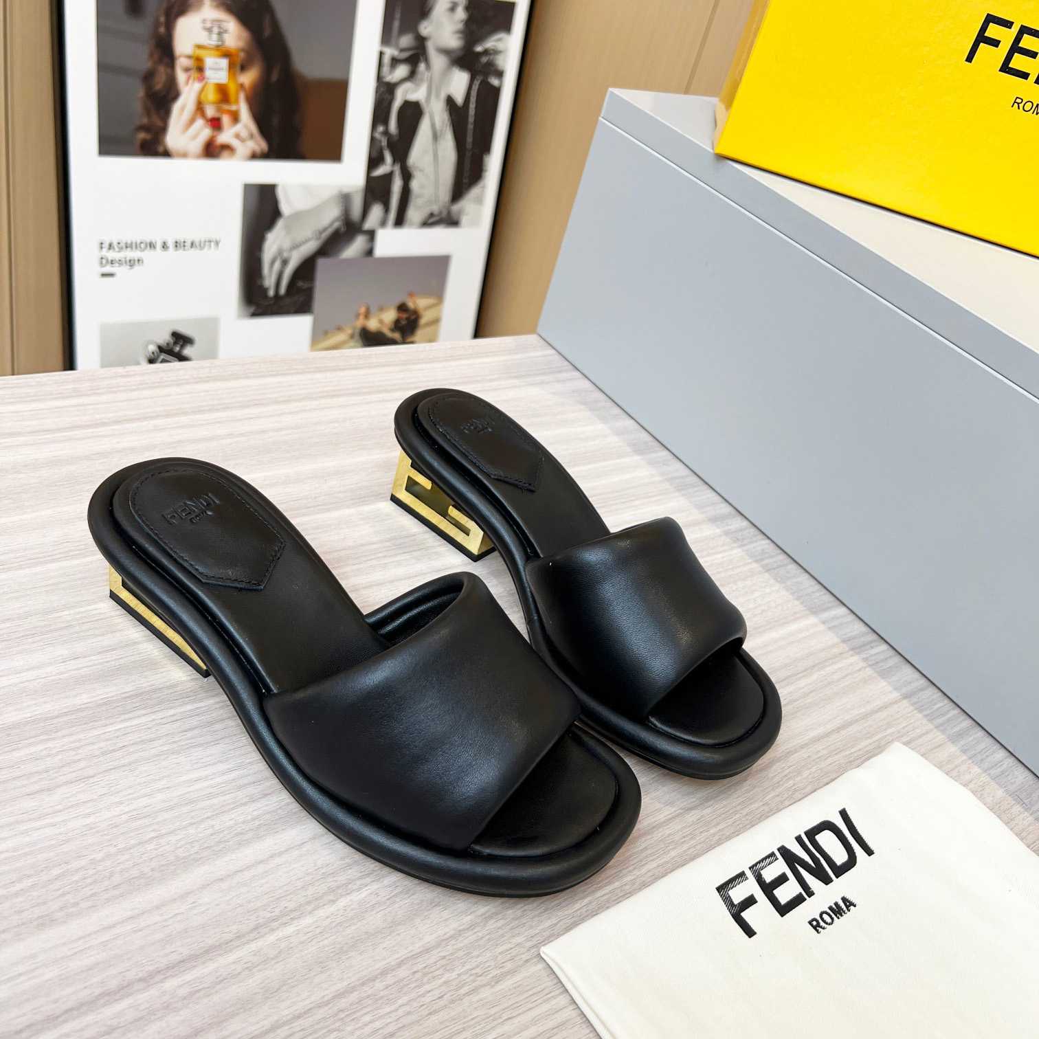 Fendi Baguette Black Nappa Leather Slides - FashionPlug