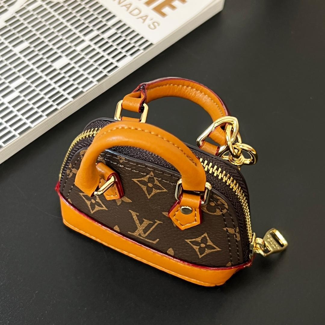 Louis Vuitton Micro Alma Bag Charm   M00995 - FashionPlug