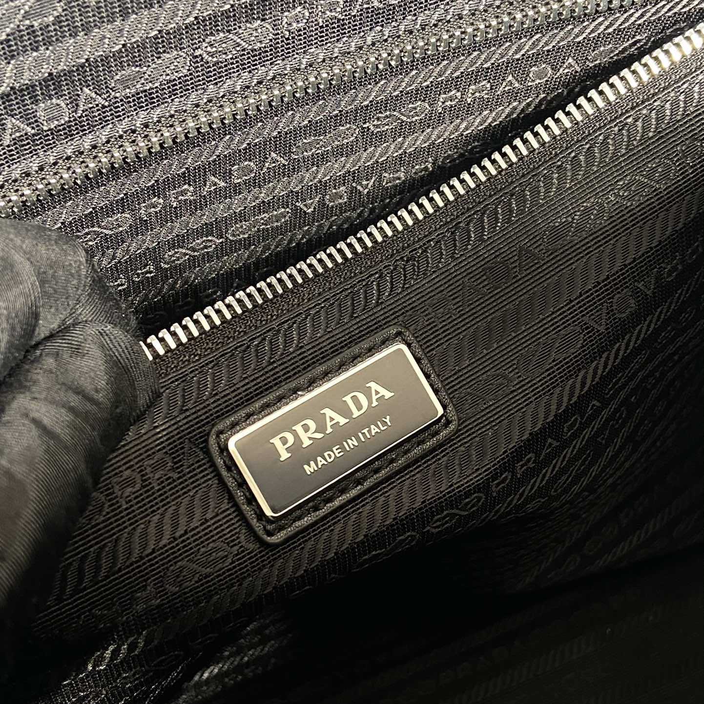 Prada Quilted Re-Nylon Travel Bag - FashionPlug