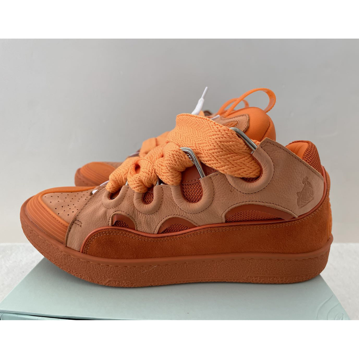Lanvin Leather Curb Sneakers - FashionPlug