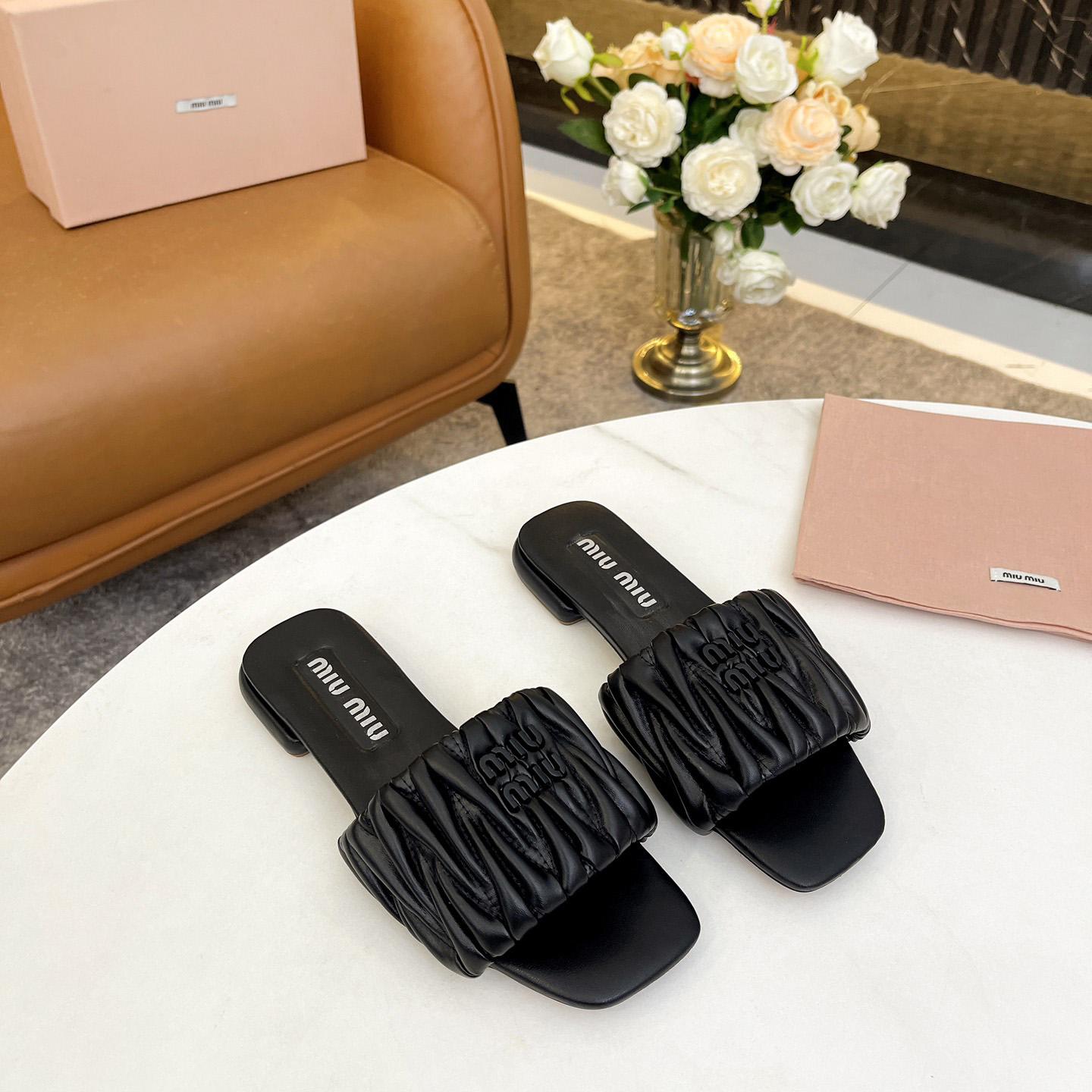 Miu Miu Matelassé Nappa Leather Slides - FashionPlug