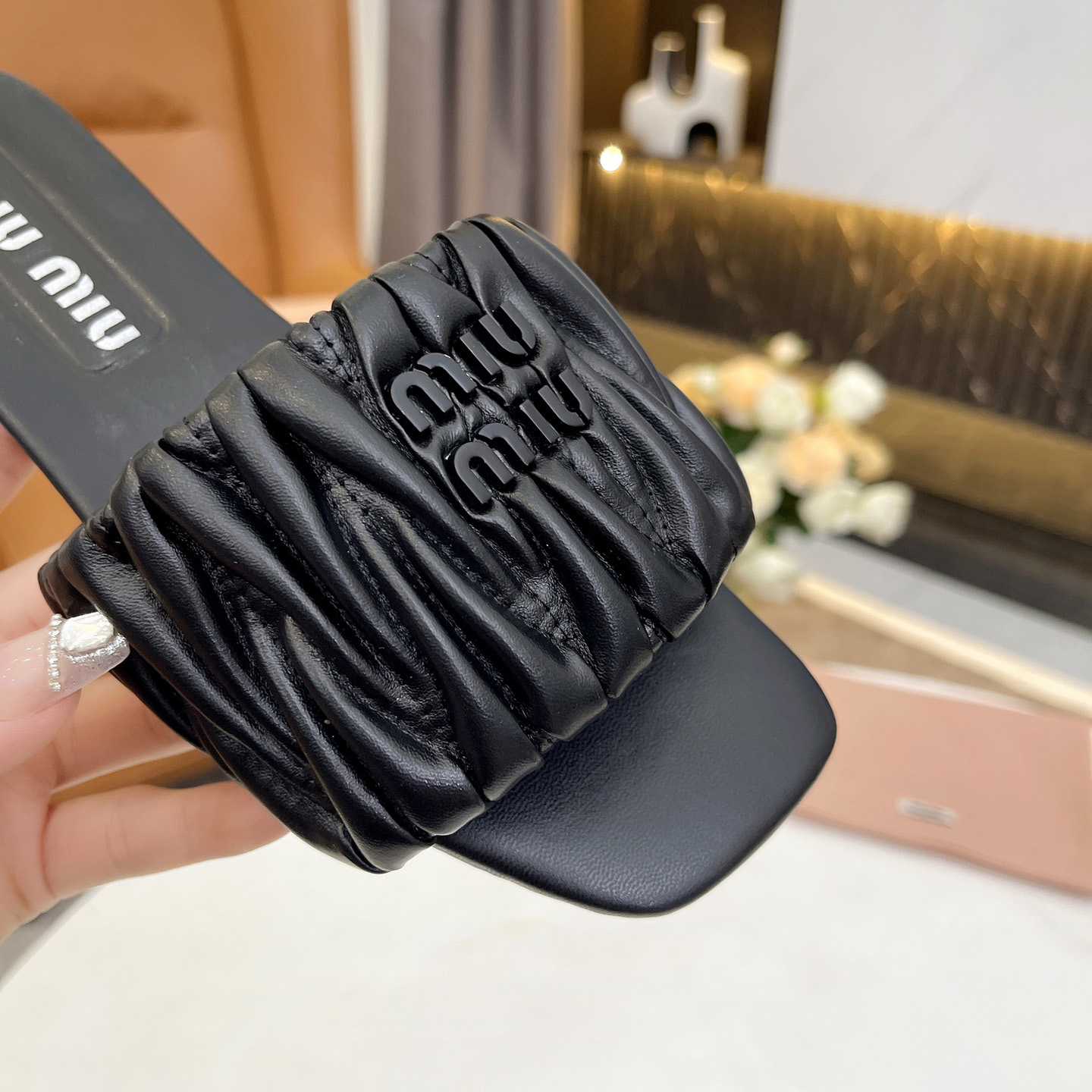 Miu Miu Matelassé Nappa Leather Slides - FashionPlug