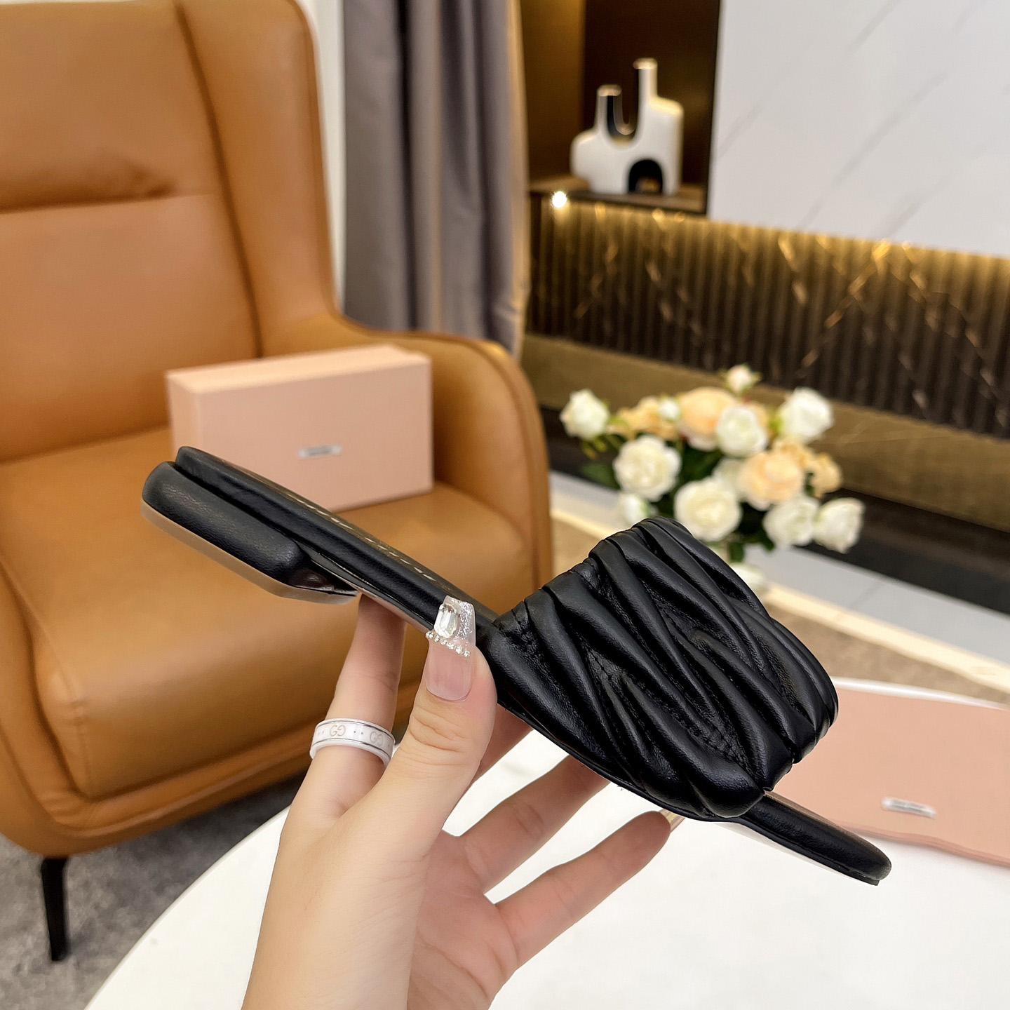 Miu Miu Matelassé Nappa Leather Slides - FashionPlug