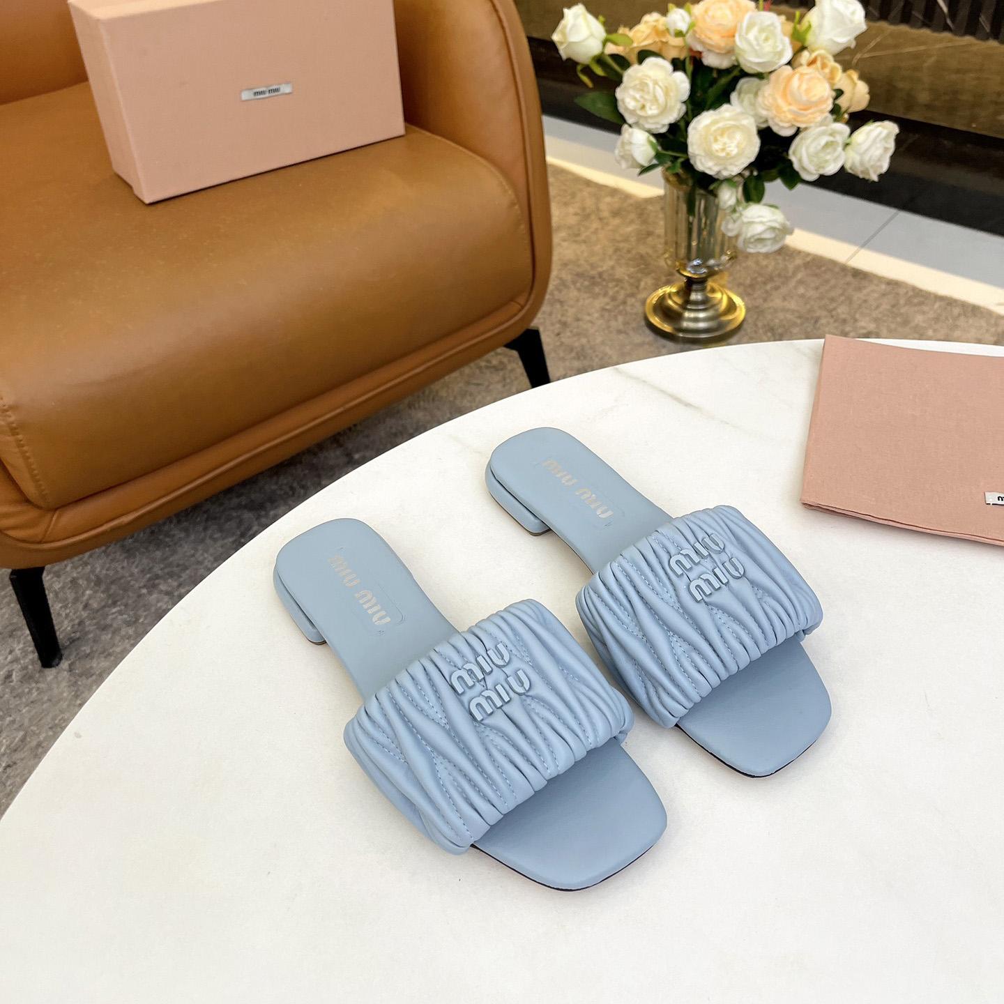 Miu Miu Matelassé Nappa Leather Slides - FashionPlug