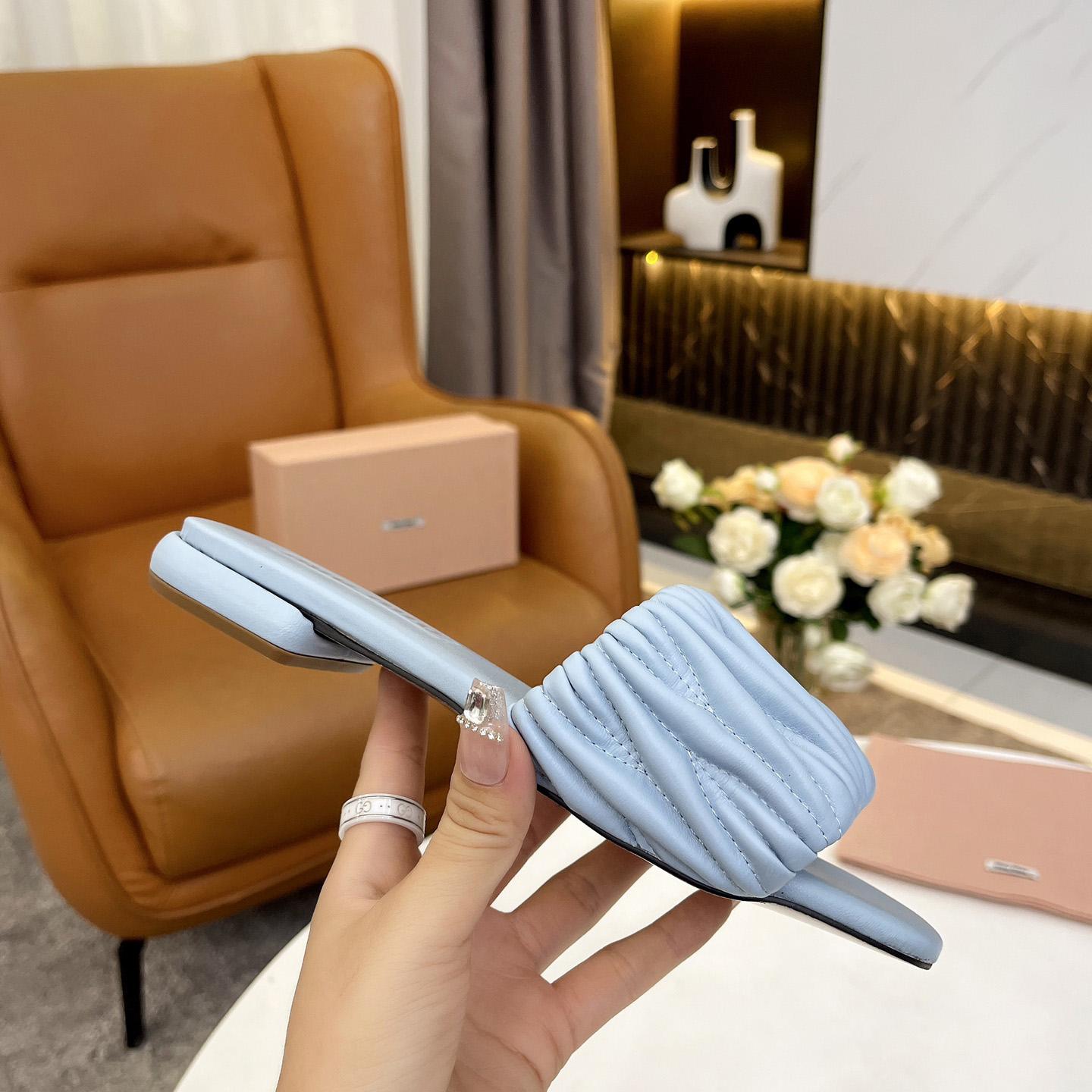 Miu Miu Matelassé Nappa Leather Slides - FashionPlug