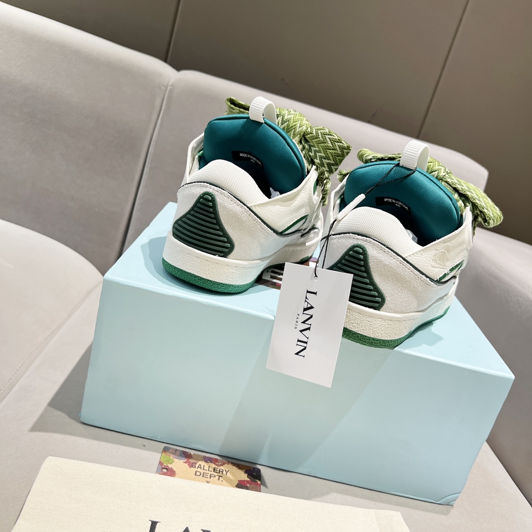 Lanvin Leather Curb Sneakers - FashionPlug