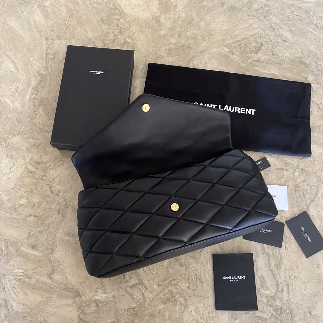 Saint Laurent Sade Puffer Quilted Leather Clutch In Black  - FashionPlug