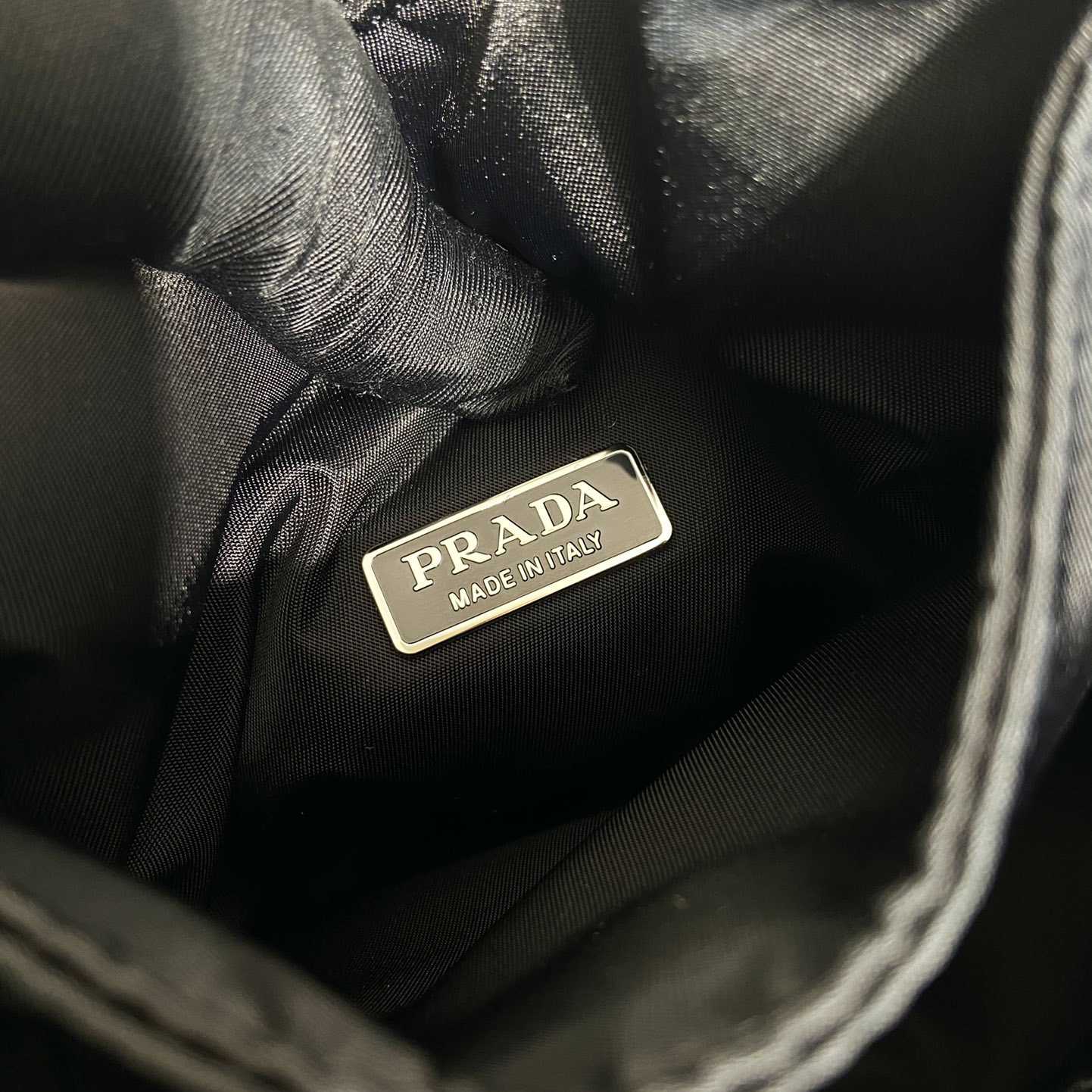 Prada Soft Padded Re-Nylon Mini-bag - FashionPlug
