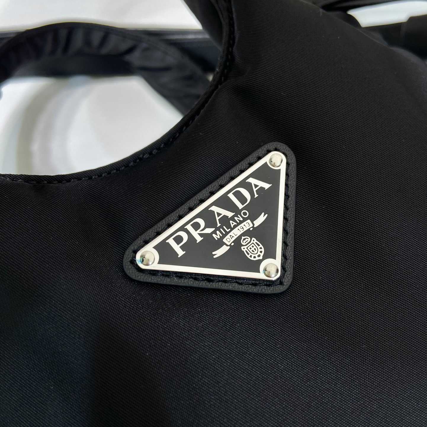 Prada Soft Padded Re-Nylon Mini-bag - FashionPlug
