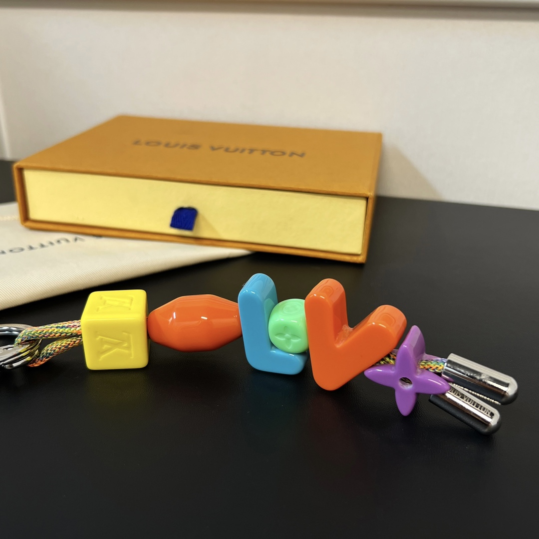 Louis Vuitton Lv Play Keychains & Holders   MP3450 - FashionPlug