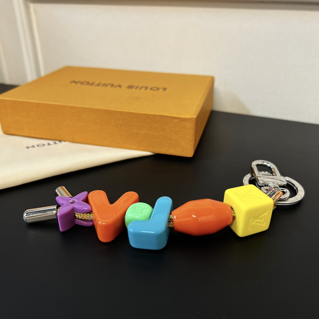 Louis Vuitton Lv Play Keychains & Holders   MP3450 - FashionPlug