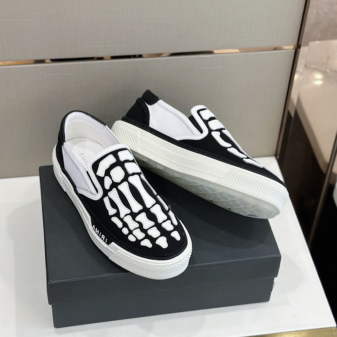 Amiri Skel Top Slip-on Sneakers - FashionPlug