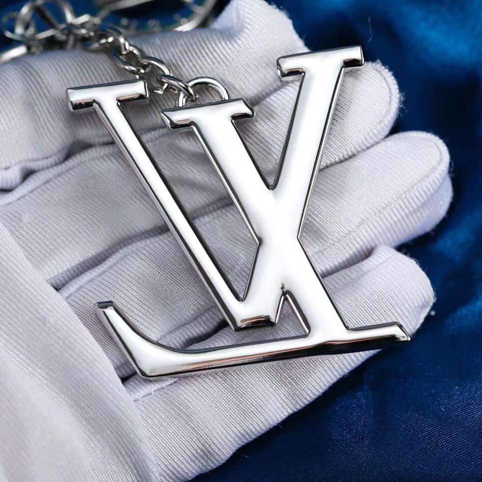 Louis Vuitton LV Initials Key Holder And Bag Charm   M01192 - FashionPlug