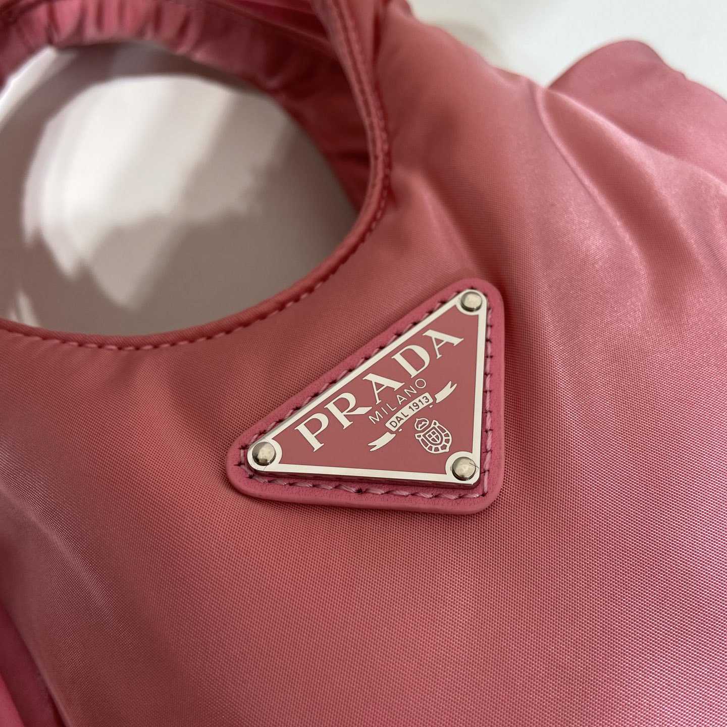 Prada Soft Padded Re-Nylon Mini-bag - FashionPlug