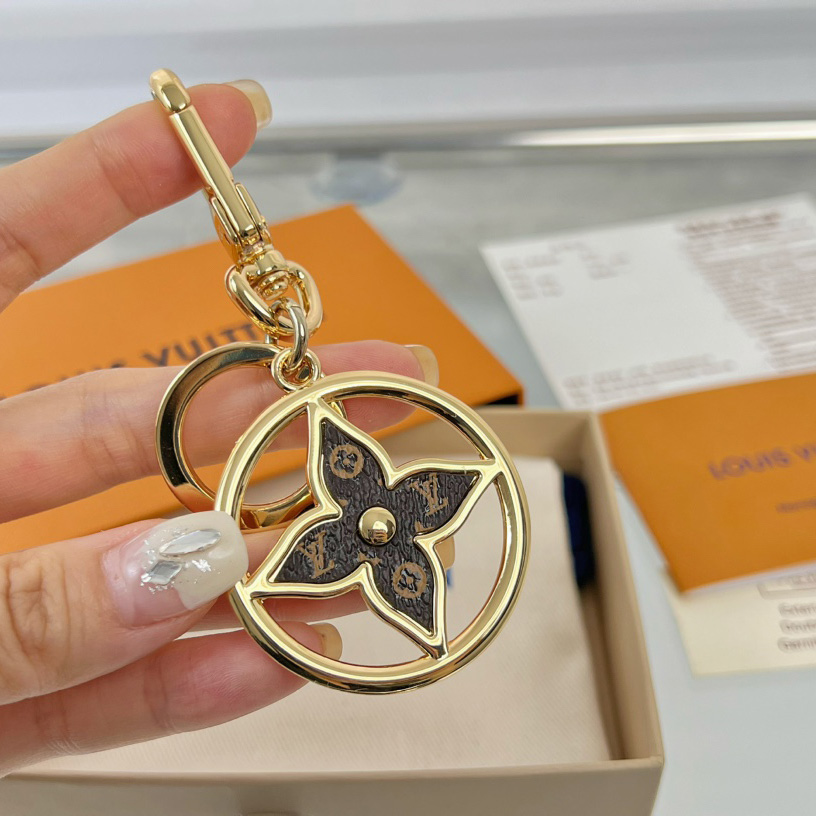 Louis Vuitton Puzzle Flower Monogram Keyring    M01207 - FashionPlug