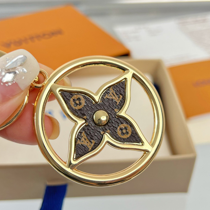 Louis Vuitton Puzzle Flower Monogram Keyring    M01207 - FashionPlug