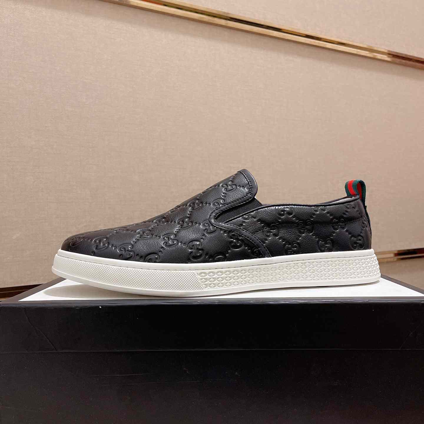 Gucci Signature Slip-on Sneakers - FashionPlug