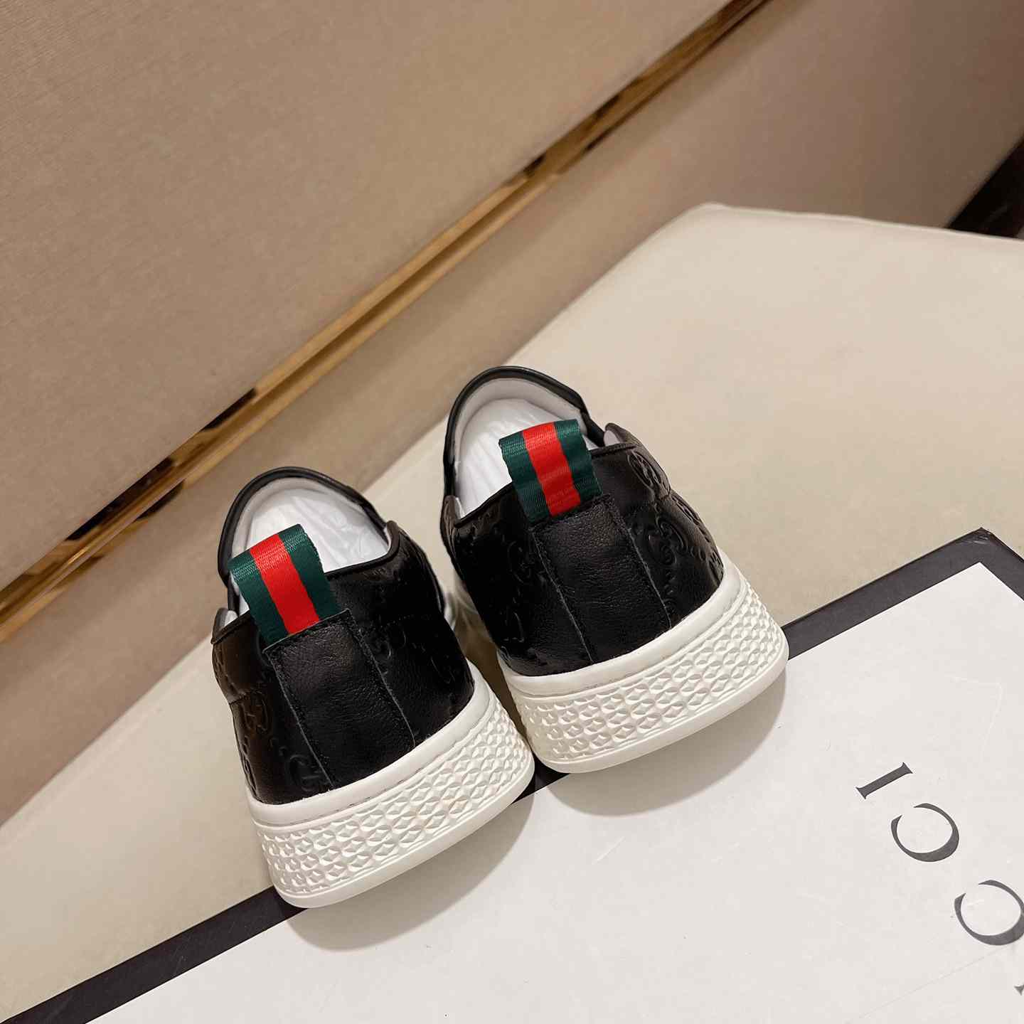 Gucci Signature Slip-on Sneakers - FashionPlug