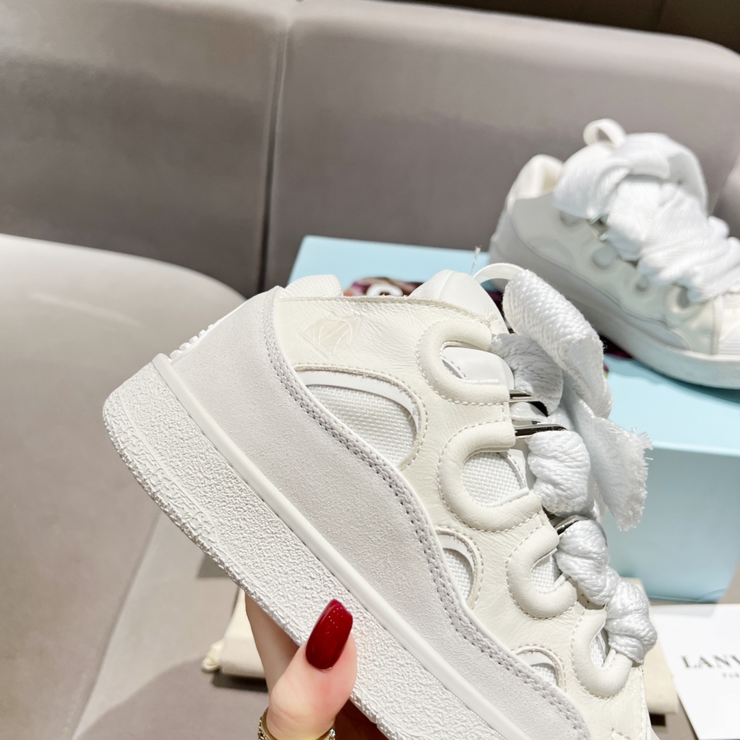 Lanvin Curb Leather Sneakers - FashionPlug