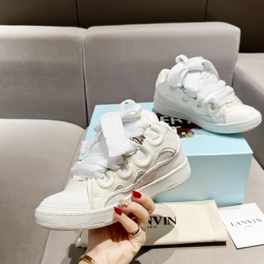 Lanvin Curb Leather Sneakers - FashionPlug