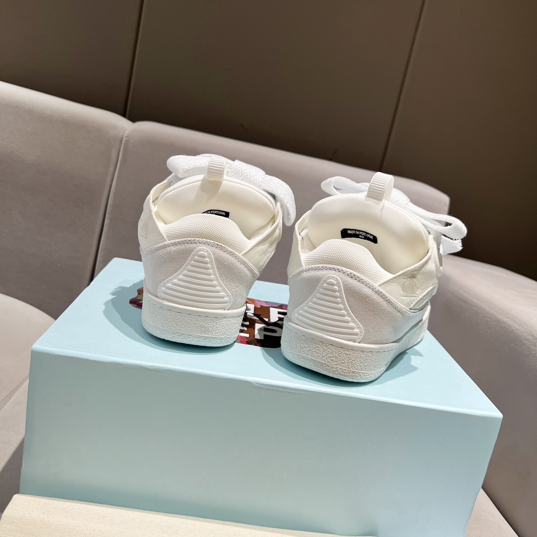 Lanvin Curb Leather Sneakers - FashionPlug