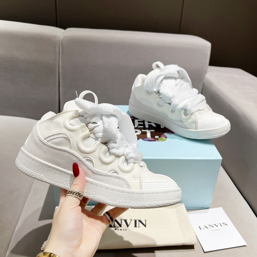Lanvin Curb Leather Sneakers - FashionPlug